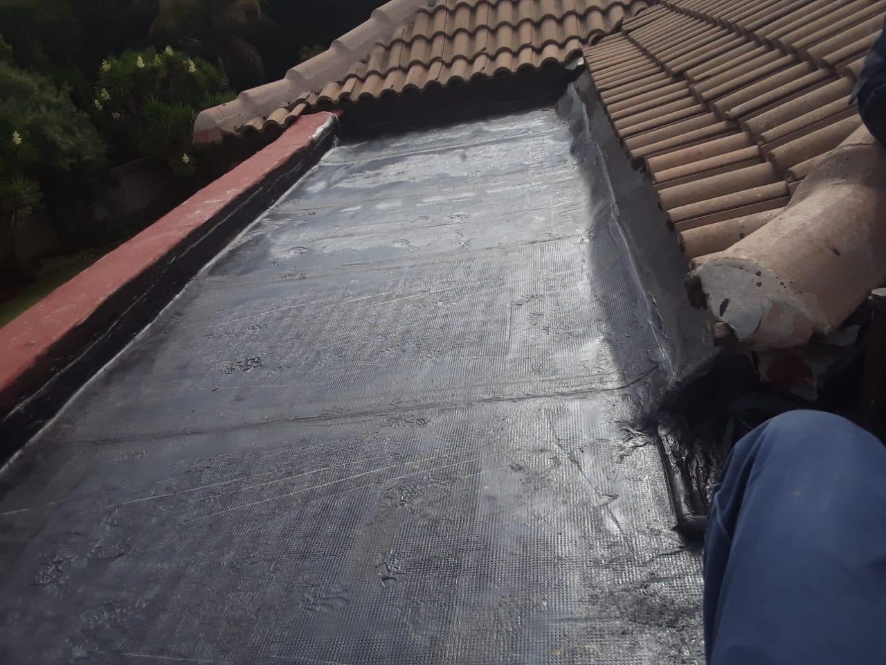 Tile roof valley waterproofing detail