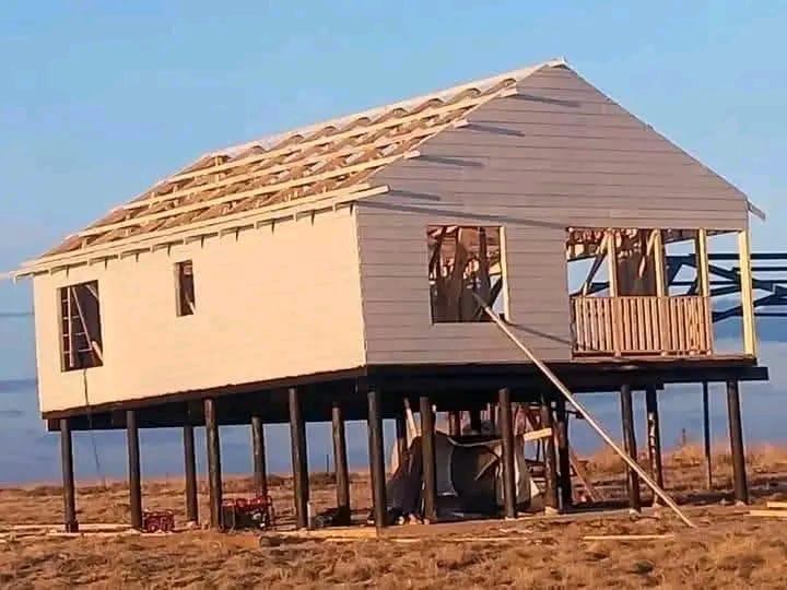 Pitched roof framing on elevated timber structure