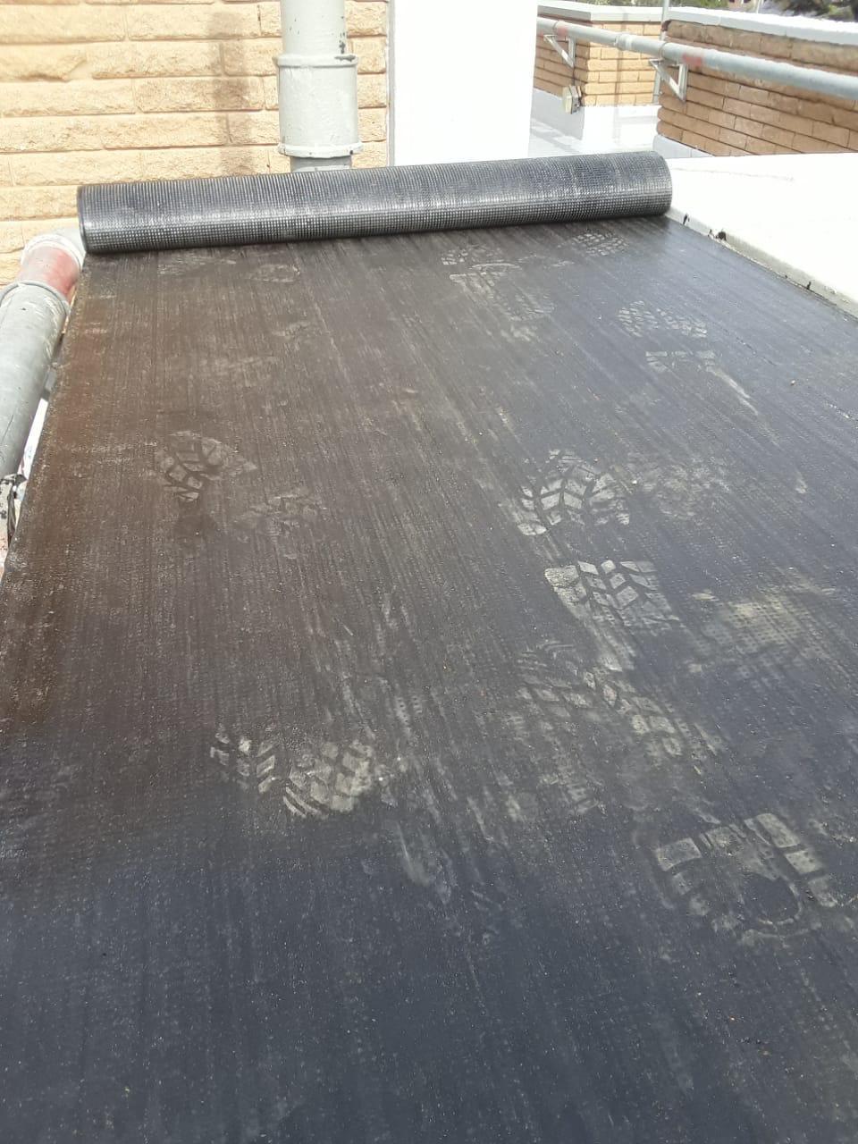 Bitumen waterproofing membrane in progress